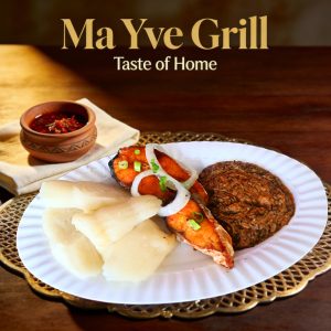 Grilled Fish with Fumbwa | Authentic Congolese charcoal-grilled tilapia with cassava leaves and kwanga at Ma Yve Grill.